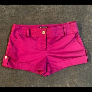 Express size 6 magenta shorts with silver buttons